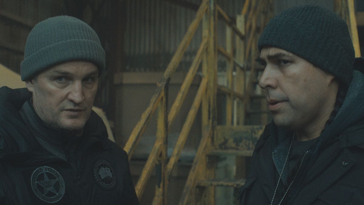 Actor Jason Clarke as Frank Remnick and actor Dallas Goldtooth as Hutch in The Last Frontier season 1, episode 4. (Photo Credit: Courtesy of Apple TV.)