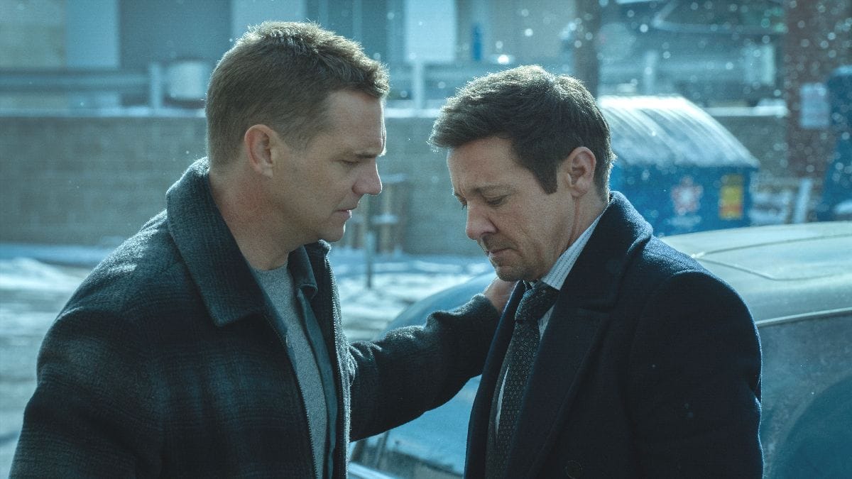 Actor Taylor Handley as Kyle McLusky and actor Jeremy Renner as Mike McLusky in the Mayor of Kingstown season 4 premiere. (Photo Credit: Courtesy of Paramount+.)