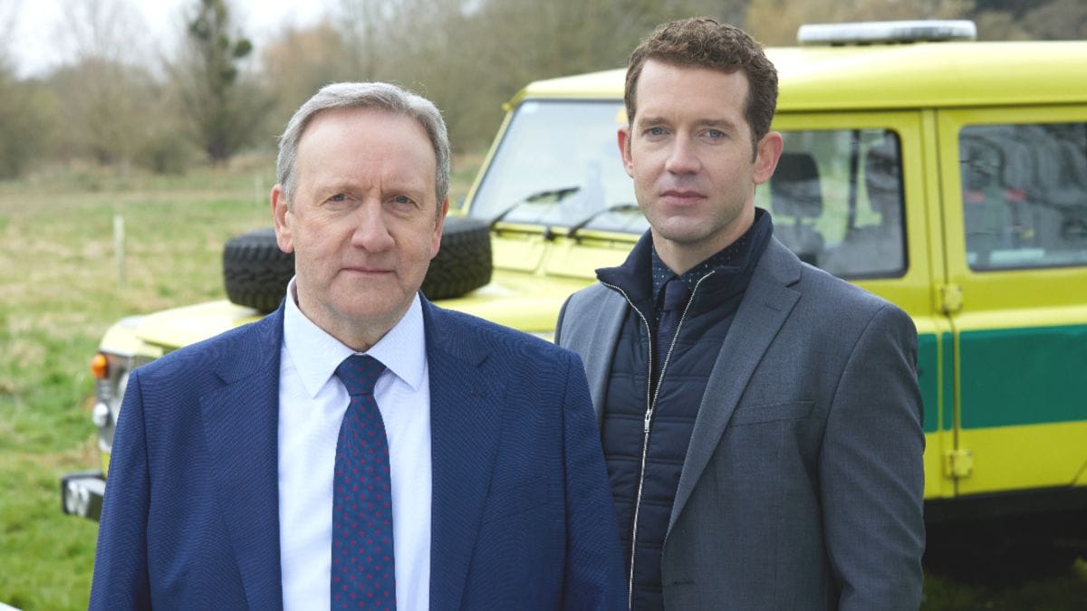 Actor Neil Dudgeon as John Barnaby and actor Nick Hendrix as Jamie Winter in Midsomer Murders season 25 episode 1. (Photo Credit: Courtesy of Acorn TV.)