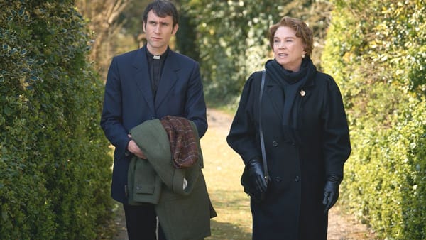 Matthew Lewis as Canon Clement and Amanda Redman as Audrey in Murder Before Evensong. (Photo Credit: Courtesy of Acorn TV.)
