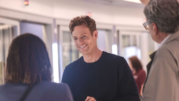 Actor Nick Gehlfuss on the set of Chicago Med's 200th episode with Oliver Platt and S. Epatha Merkerson. (Photo Credit: Courtesy of NBC.)